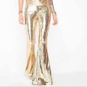 Gold sequin flare pants Dolls Kill Club Exx